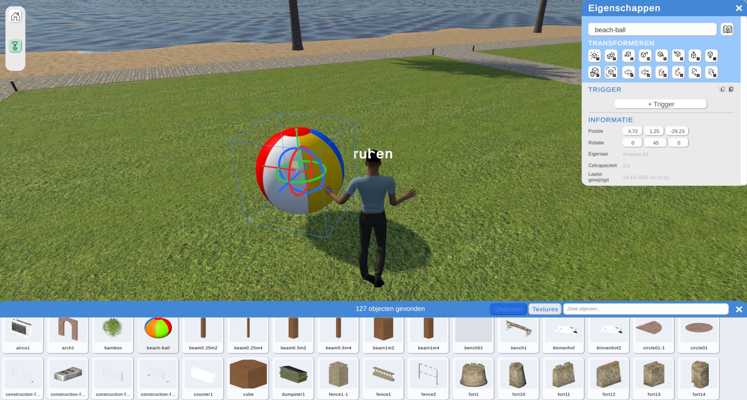 Een virtuele kustwereld met bouwgereedschappen en de object-Inspector.